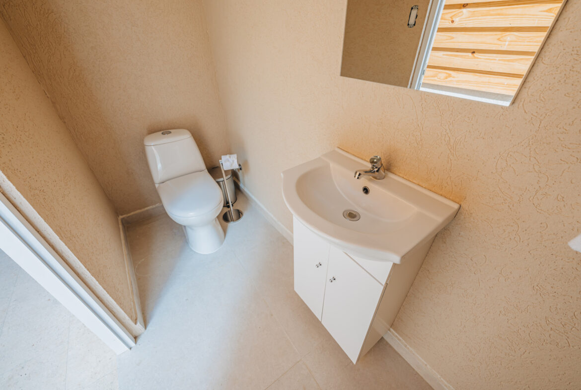 Bathroom with toilet and vanity sink, Seaside Modern Villa, Aruba