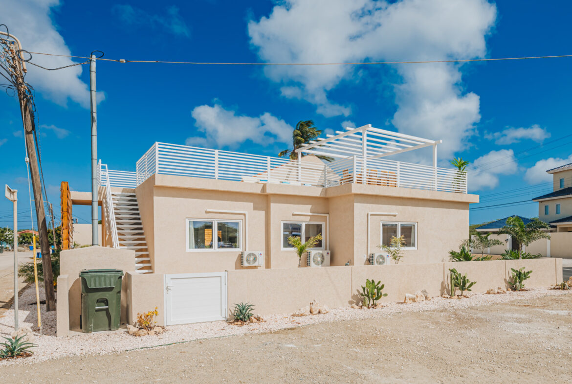 Exterior view of Seaside Modern Villa with rooftop terrace and pergola, Aruba